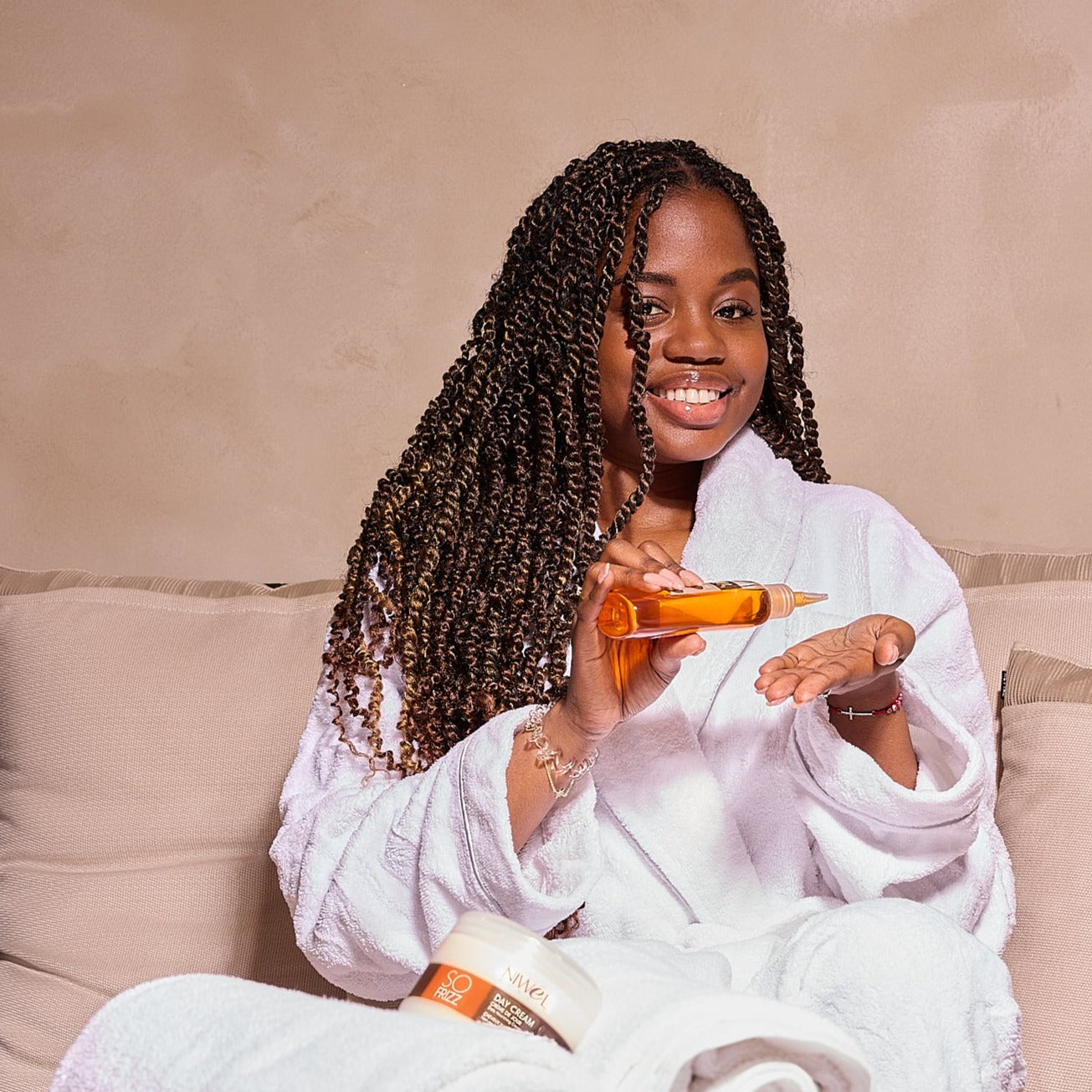 huile sur cheveux afro et twists
