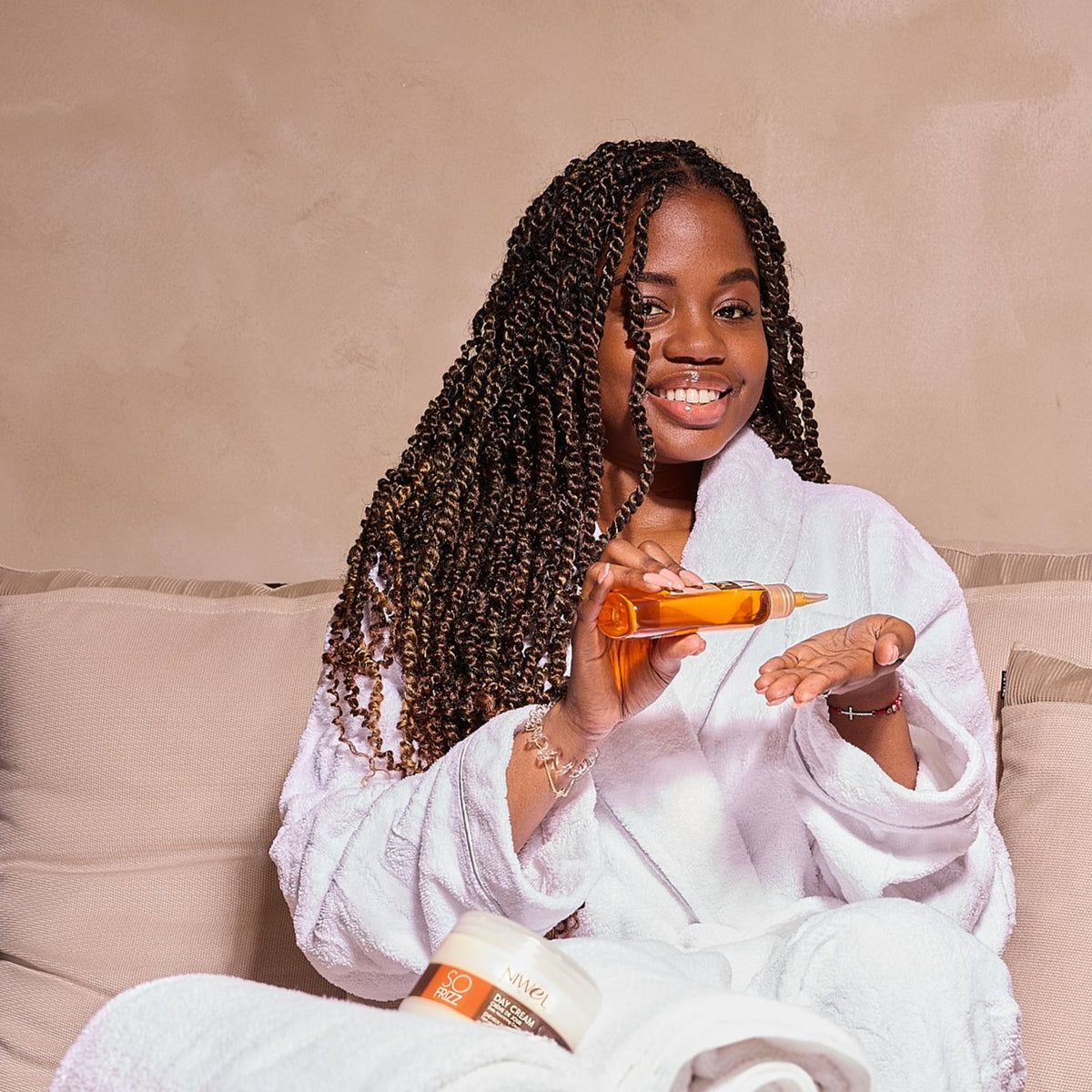 huile sur cheveux afro et twists
